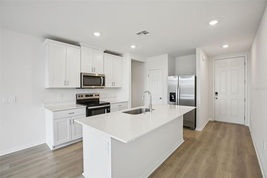 Furnished interior view inside a new home in Villamar - Classic Series, Winter Haven (Image 5).