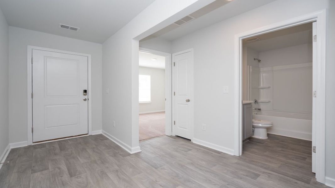 Representative unfurnished interior of a home built from the ARIA by D.R. Horton in Stanbury Creek, Supply (Image 9).