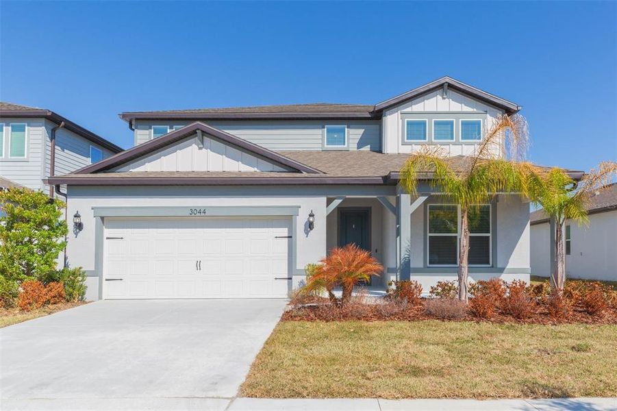 Front exterior of a new home in Valri Forest, Valrico, FL, highlighting curb appeal (Image 2). Front exterior of a new home in Valri Forest, Valrico, FL, highlighting curb appeal (Image 2).