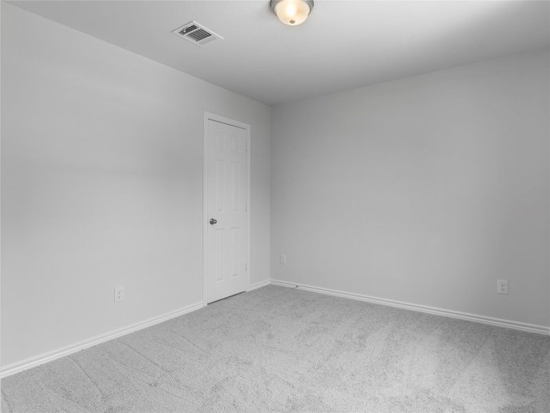 Upstairs 4th bedroom with cozy carpet flooring. Upstairs 4th bedroom with cozy carpet flooring.