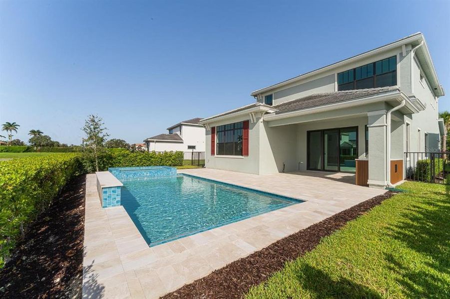 Exterior details and patio area of a home in Tesoro Club, Port St. Lucie (Image 25).