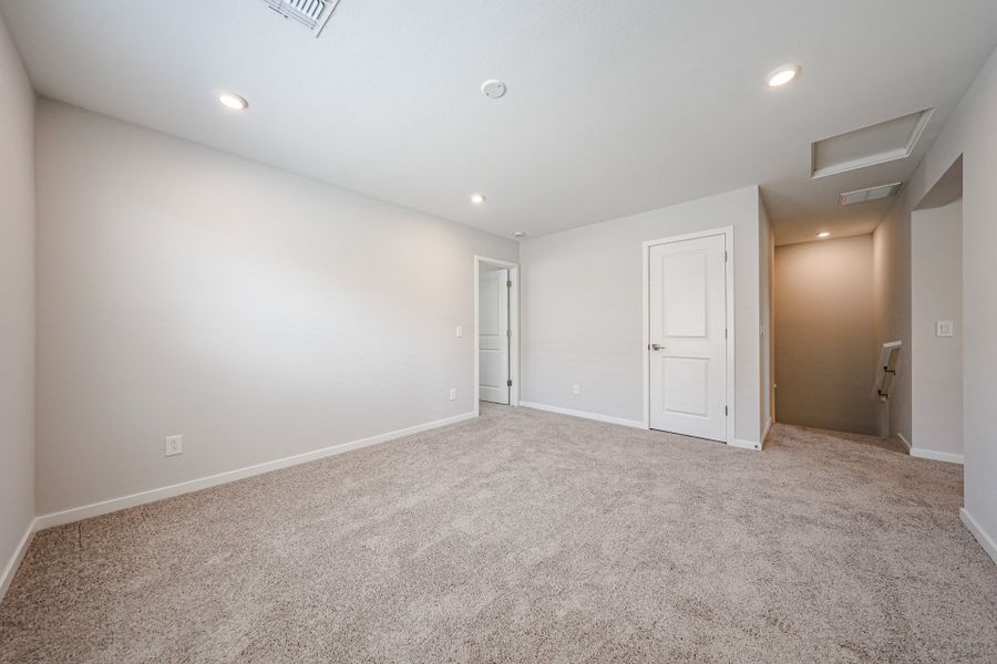 A room with white doors.