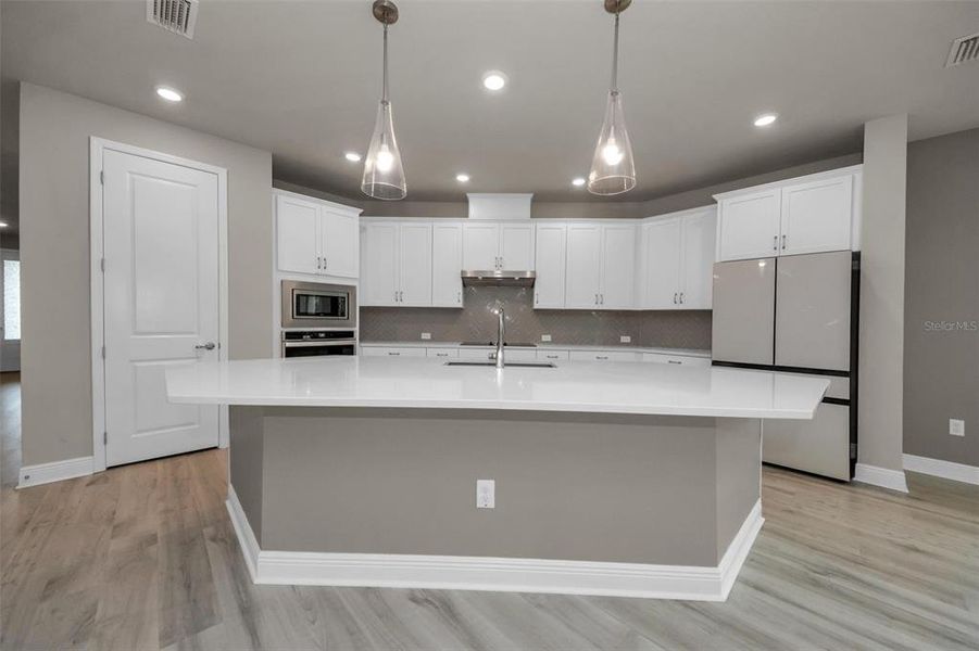 Furnished interior view inside a new home in Eagle Creek - Garden Series, Tarpon Springs (Image 7).