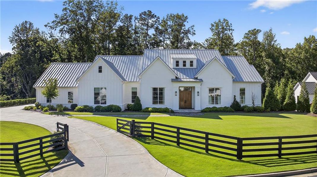 Front exterior of a new home in , Alpharetta, GA, highlighting curb appeal (Image 18). Front exterior of a new home in , Alpharetta, GA, highlighting curb appeal (Image 18).