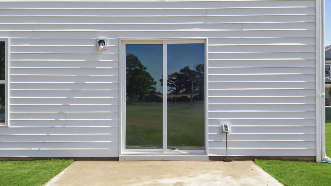 Exterior details and patio area of a home in Hobbs Farm, Ayden (Image 23). Exterior details and patio area of a home in Hobbs Farm, Ayden (Image 23).
