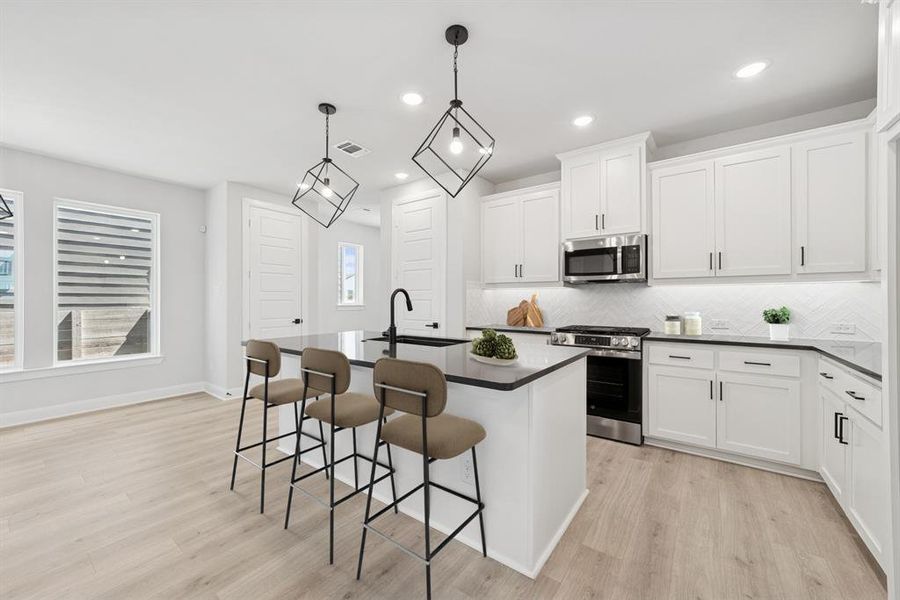 Furnished interior view inside a new home in Painted Tree Woodland West – Cottages, McKinney (Image 3). Furnished interior view inside a new home in Painted Tree Woodland West – Cottages, McKinney (Image 3).