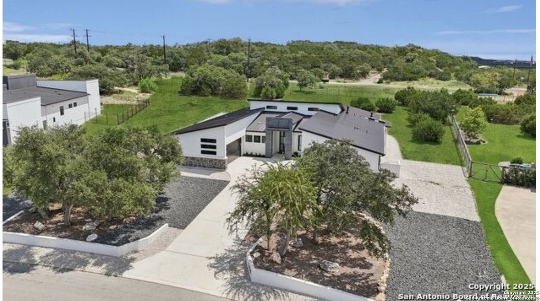 Front exterior of a new home in , San Antonio, TX, highlighting curb appeal (Image 22). Front exterior of a new home in , San Antonio, TX, highlighting curb appeal (Image 22).
