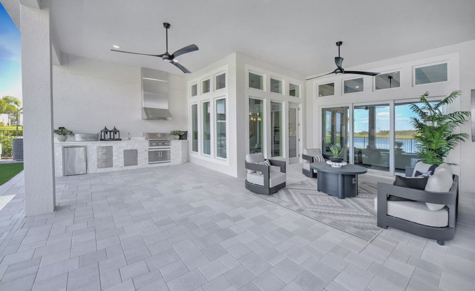 Exterior details and patio area of a home in Waterset, Apollo Beach (Image 26).