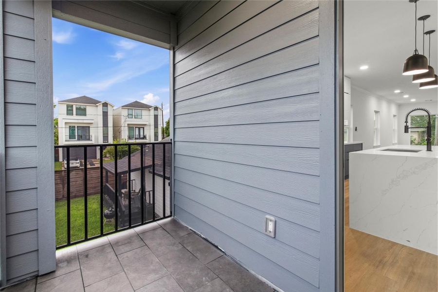 Exterior details and patio area of a home in , Houston (Image 3).