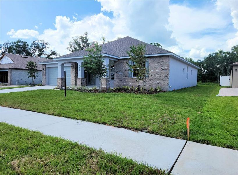 Front exterior of a new home in , Plant City, FL, highlighting curb appeal (Image 24). Front exterior of a new home in , Plant City, FL, highlighting curb appeal (Image 24).