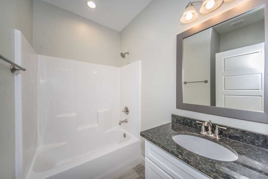 Representative interior finishes for a home built from the Mediterranean by Enchanted Homes in Lonesome Dove, San Antonio (Image 18).