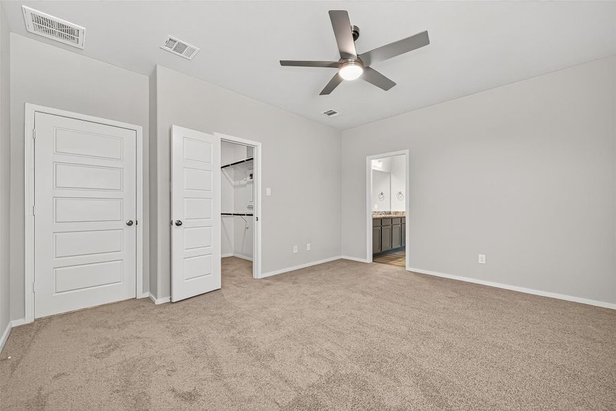 Spacious, unfurnished interior of a new home in Sunterra, Katy (Image 34).