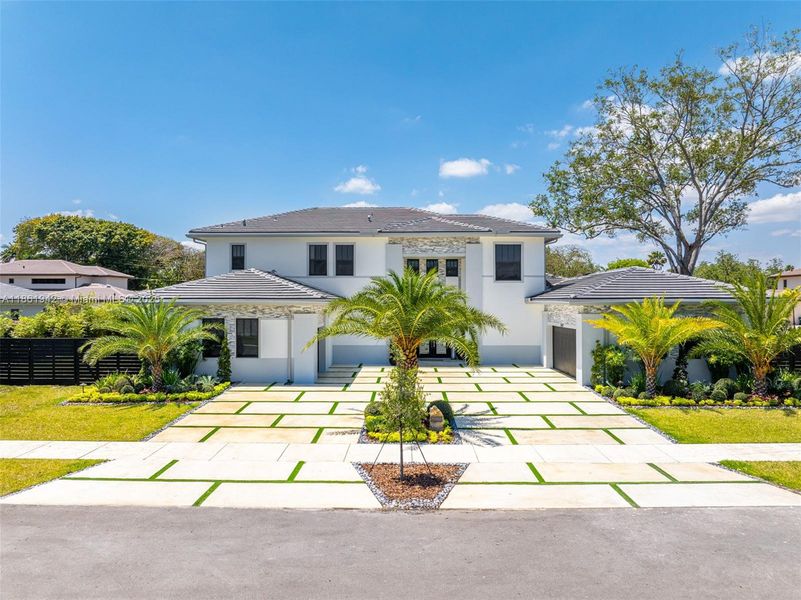 Front exterior of a new home in , Miami, FL, highlighting curb appeal (Image 29). Front exterior of a new home in , Miami, FL, highlighting curb appeal (Image 29).