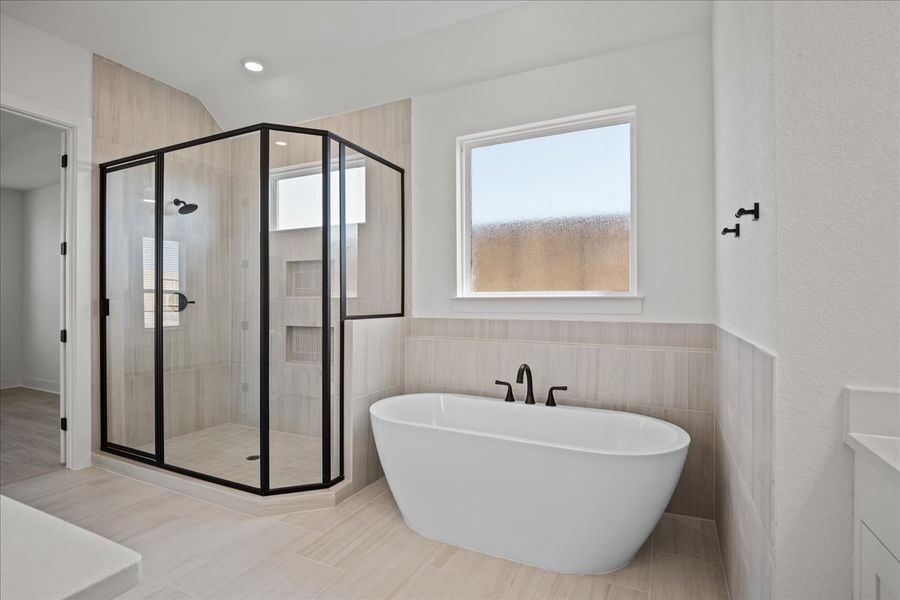 Furnished interior view inside a new home in Village at Three Oaks, Seguin (Image 11).