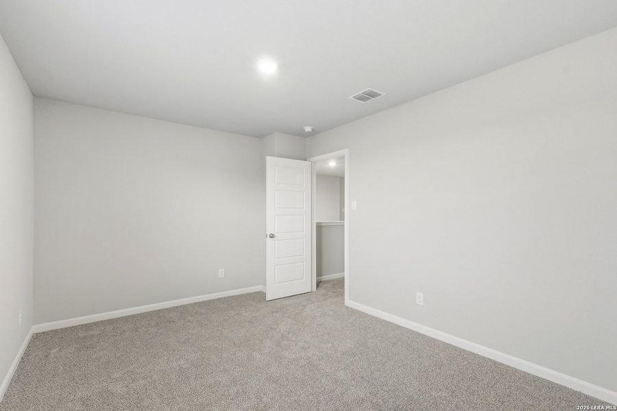 Spacious, unfurnished interior of a new home in Abbott Place, St. Hedwig (Image 14).