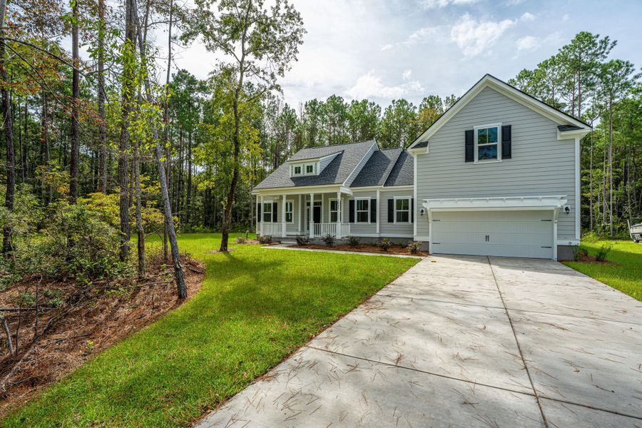 Exterior details and patio area of a home in , Awendaw (Image 26).