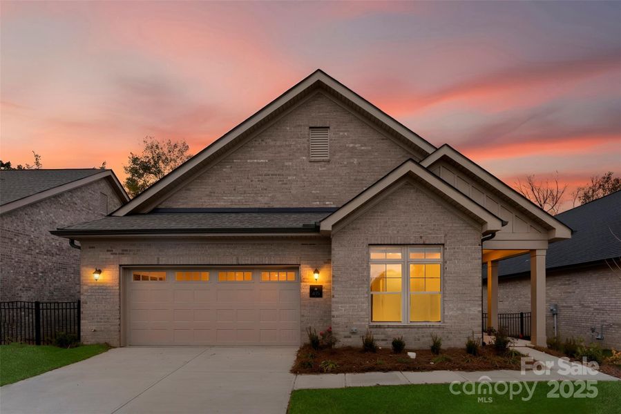 Front exterior of a new home in The Courtyards on New Hope, Gastonia, NC, highlighting curb appeal (Image 1).