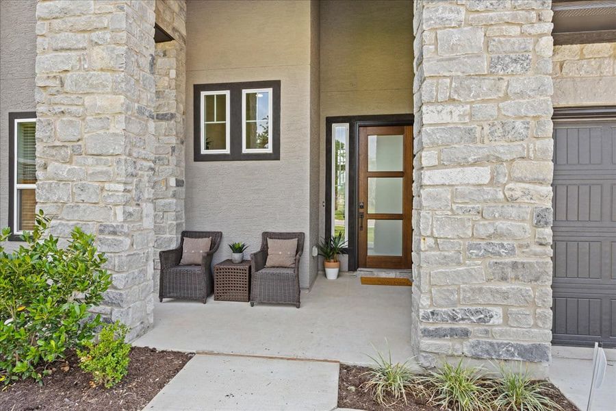 Exterior details and patio area of a home in 6 Creeks, Kyle (Image 24).