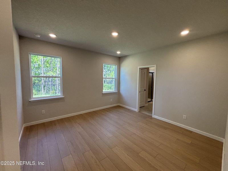 Spacious, unfurnished interior of a new home in The Magnolia Series at Reserve East, Flagler Beach (Image 12).