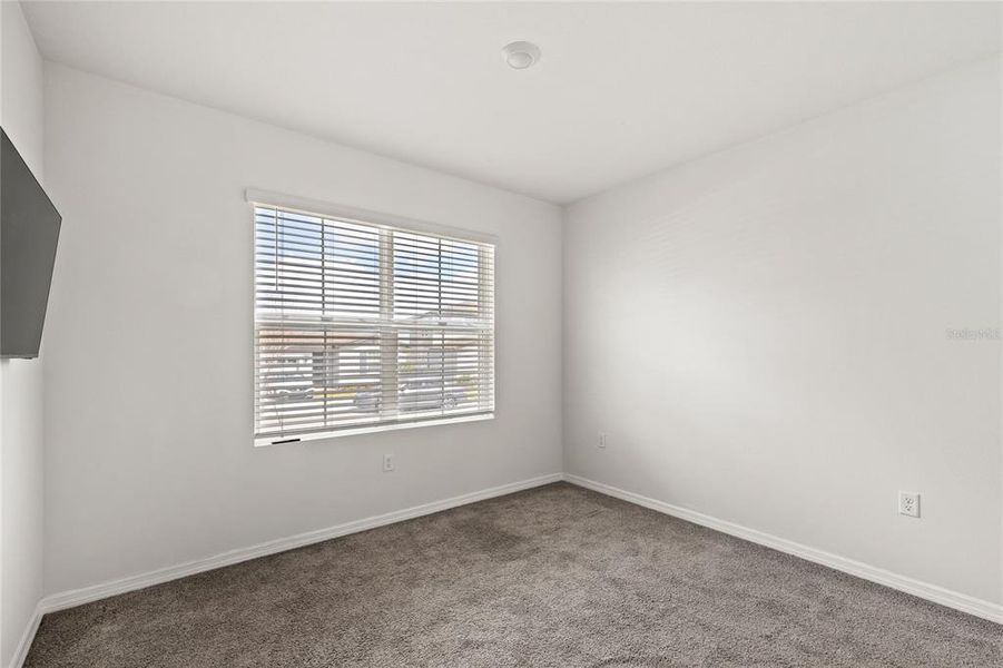 Spacious, unfurnished interior of a new home in Eden Hills, Lake Alfred (Image 21).