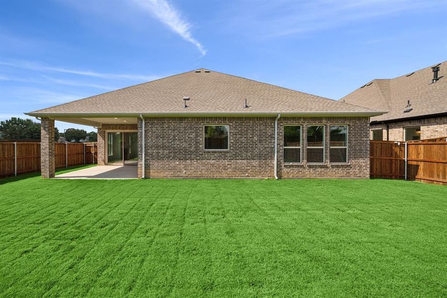 Exterior details and patio area of a home in Sterling Greene, Arlington (Image 3). Exterior details and patio area of a home in Sterling Greene, Arlington (Image 3).