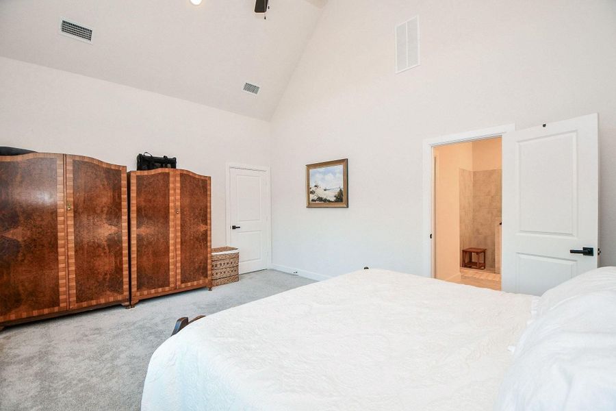 Primary suite is a true haven. Motorized blinds here will help ensure a good night's rest! Primary suite is a true haven. Motorized blinds here will help ensure a good night's rest!