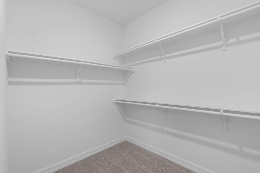 A view of your large primary walk-in Closet