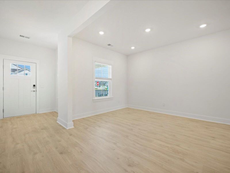 Spacious, unfurnished interior of a new home in The Coves at Lakes of Cane Bay, Summerville (Image 17).