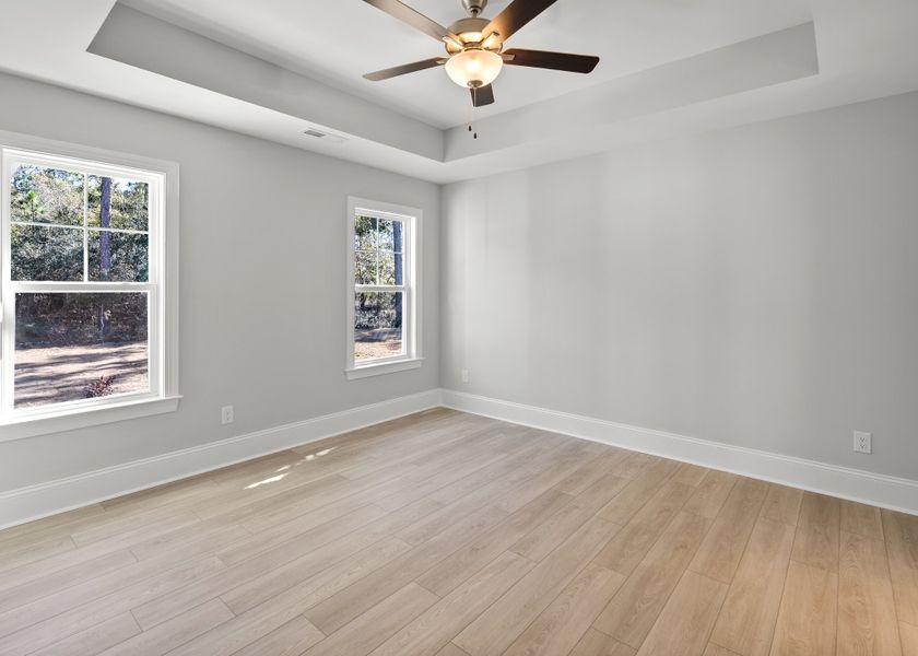 Spacious, unfurnished interior of a new home in Osprey Landing, Southport (Image 23).