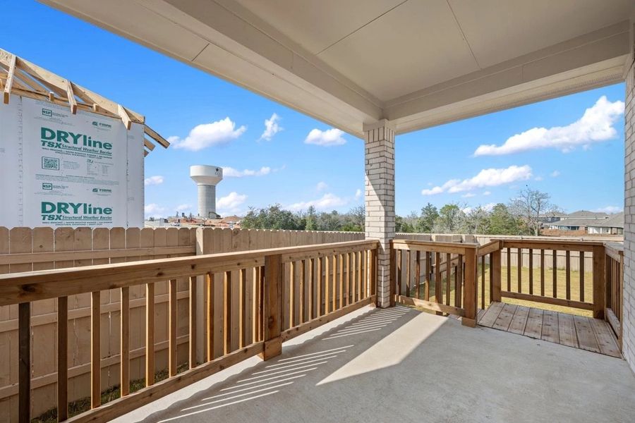 Exterior details and patio area of a home in The Colony, Bastrop (Image 4).