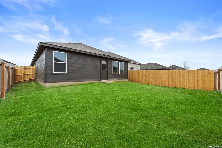 Exterior details and patio area of a home in Randolph Crossing: Cottage Collection, Converse (Image 2). Exterior details and patio area of a home in Randolph Crossing: Cottage Collection, Converse (Image 2).