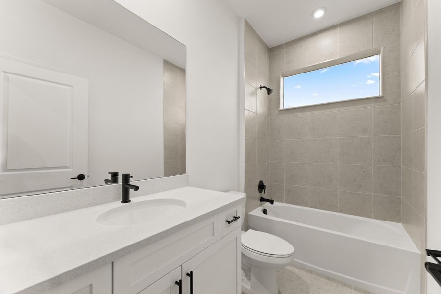 Furnished interior view inside a new home in Newfield - Rosette Park, Palm City (Image 6).