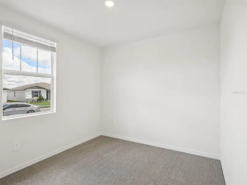 Spacious, unfurnished interior of a new home in The Reserve at Van Oaks, Auburndale (Image 15).