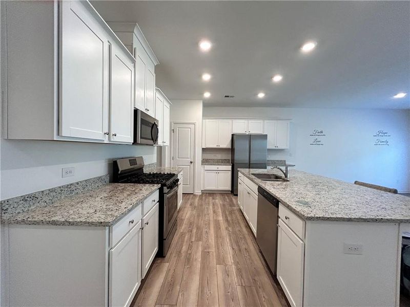 Furnished interior view inside a new home in , Suwanee (Image 8).
