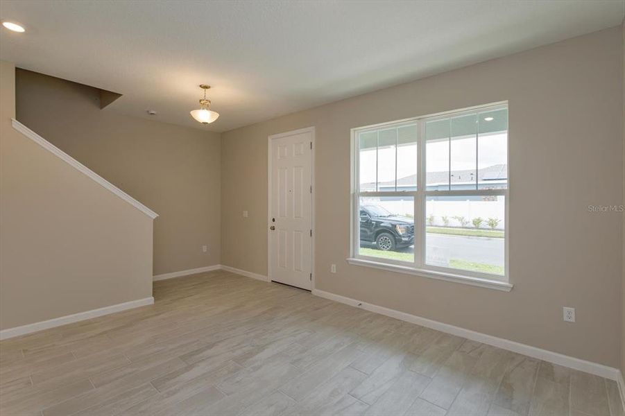 Spacious, unfurnished interior of a new home in Serenade at Ovation, Winter Garden (Image 19).