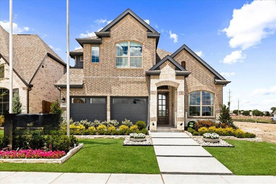 Front exterior of a new home in Summer Crest, Fort Worth, TX, highlighting curb appeal (Image 2).