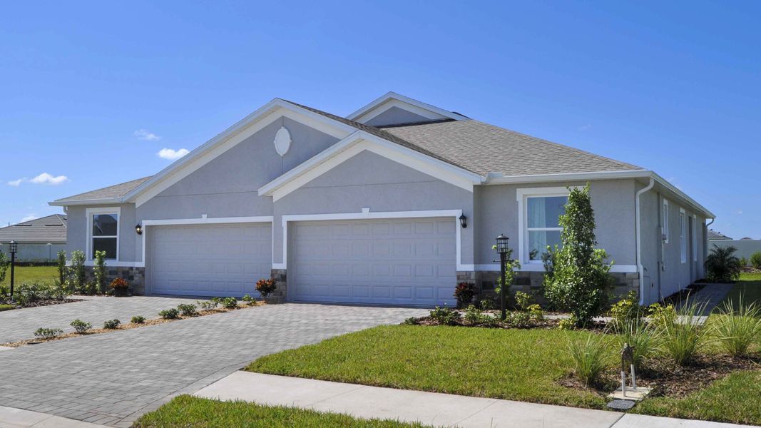Front exterior of a new home in Coddington, Bradenton, FL, highlighting curb appeal (Image 1). Front exterior of a new home in Coddington, Bradenton, FL, highlighting curb appeal (Image 1).