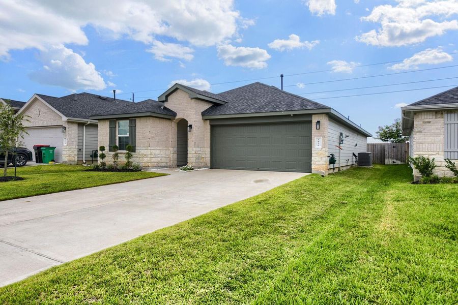 Front exterior of a new home in , Fulshear, TX, highlighting curb appeal (Image 1). Front exterior of a new home in , Fulshear, TX, highlighting curb appeal (Image 1).
