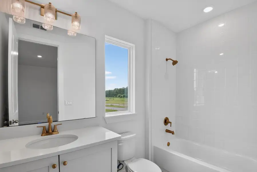 Furnished interior view inside a new home in Ardisia Park, New Smyrna Beach (Image 12).