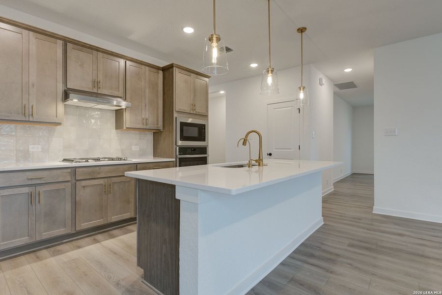 Furnished interior view inside a new home in Nopal Valley, San Antonio (Image 6).