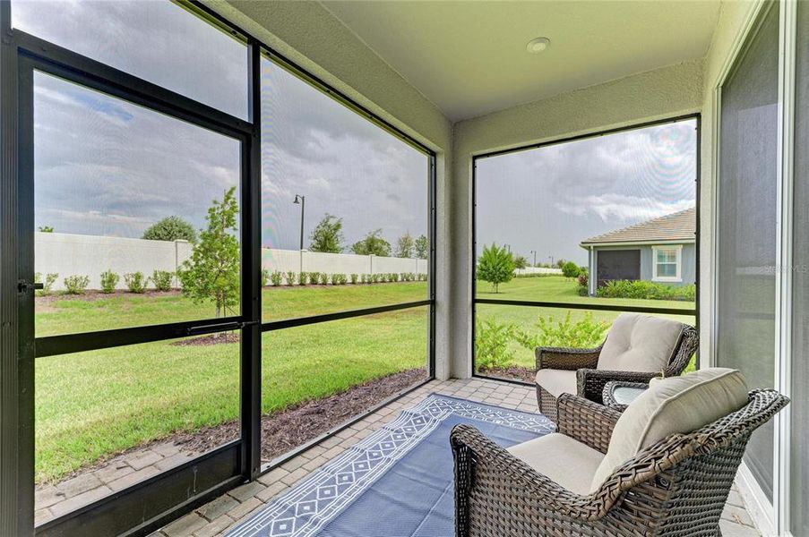 Exterior details and patio area of a home in Wellen Park, Venice (Image 22).