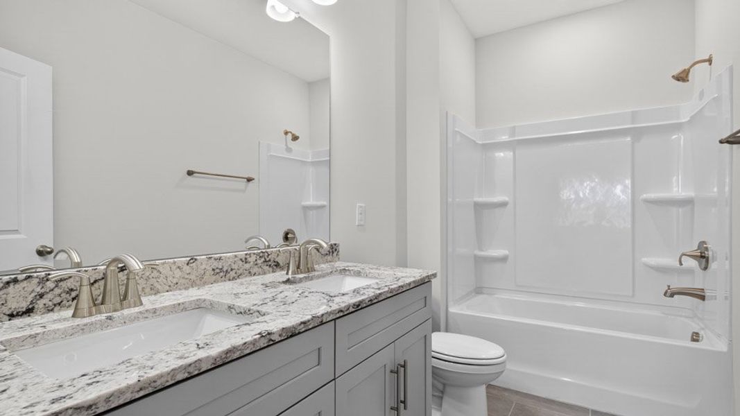 Furnished interior view inside a new home in The Manors at Haywood Glen, Knightdale (Image 10).