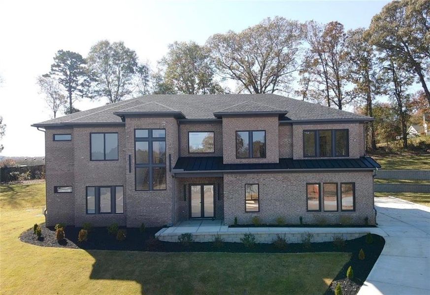Front exterior of a new home in , Auburn, GA, highlighting curb appeal (Image 2). Front exterior of a new home in , Auburn, GA, highlighting curb appeal (Image 2).