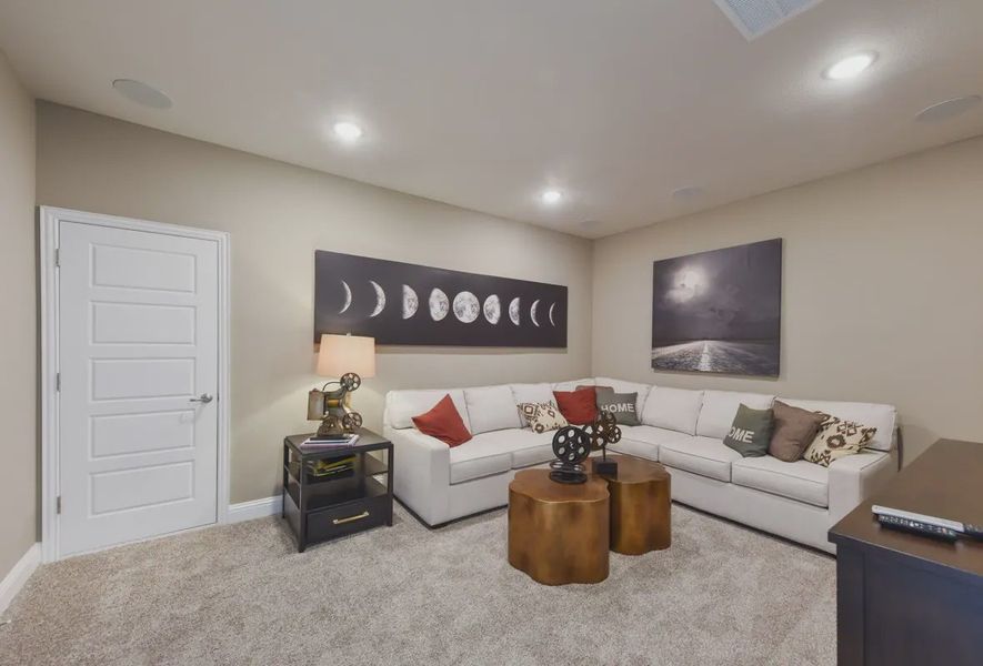 Representative furnished interior of a home built from the Waylon by Chesmar Homes in 6 Creeks, Kyle (Image 9).