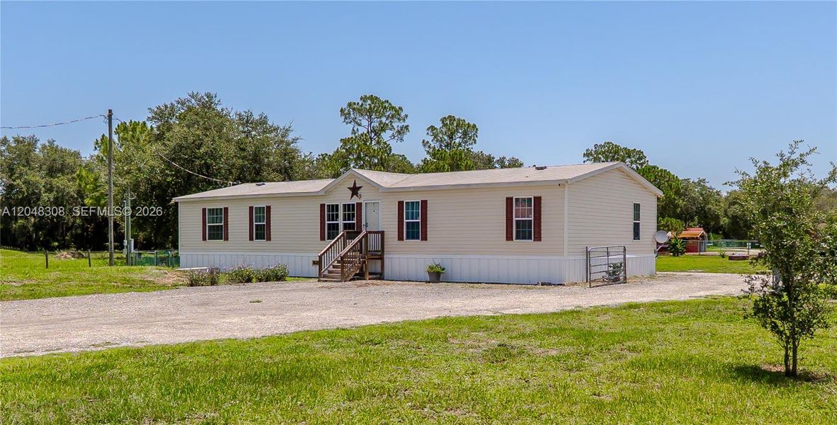 Exterior details and patio area of a home in , Clewiston (Image 22). Exterior details and patio area of a home in , Clewiston (Image 22).