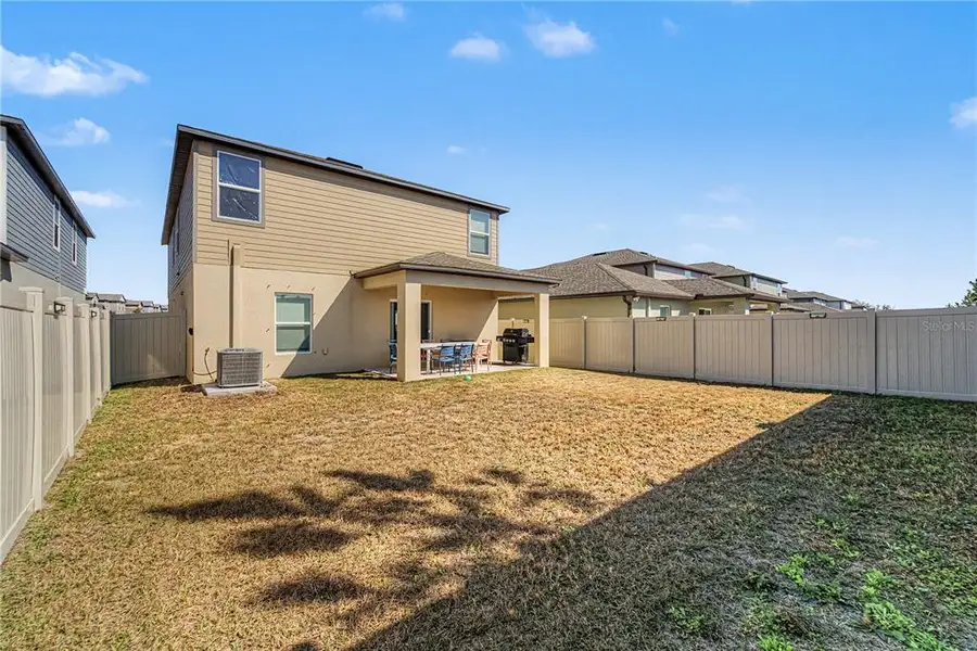 Exterior details and patio area of a home in Two Rivers, Zephyrhills (Image 4).