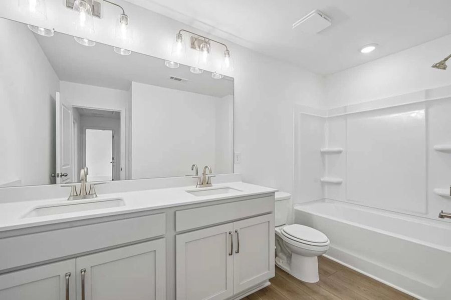 Representative Photo: Bathroom Two featuring Milan Collection Finishes