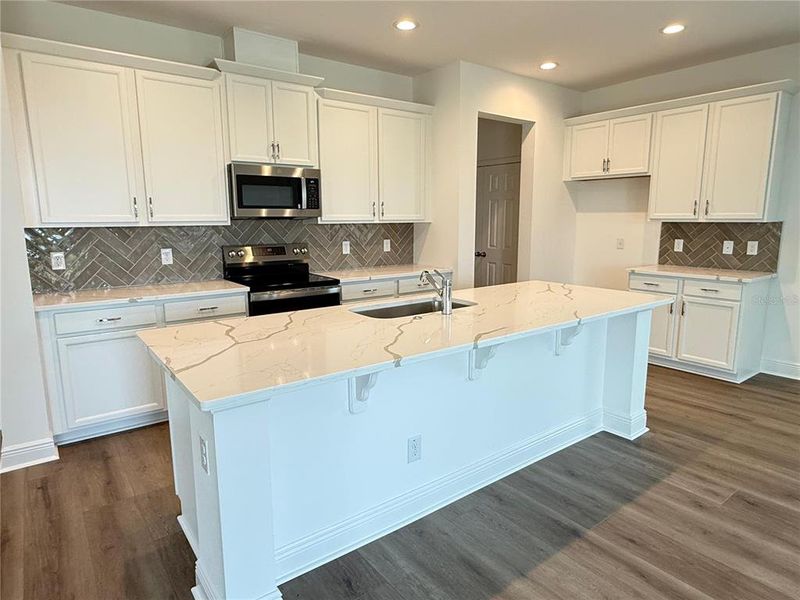 Furnished interior view inside a new home in Ridgeview, Clermont (Image 3).