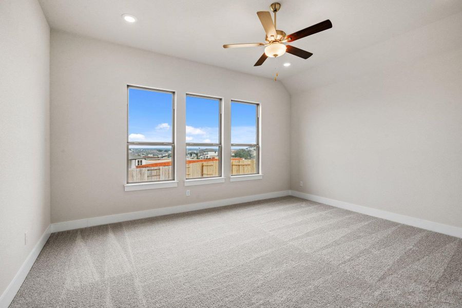 Primary Bedroom with elevated ceiling