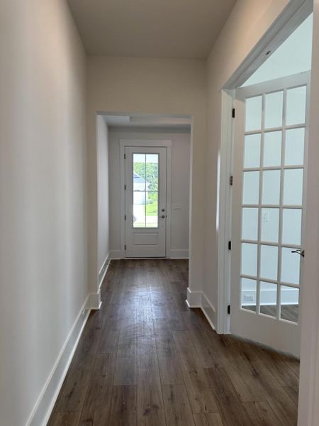 Spacious, unfurnished interior of a new home in Summerwind Crossing at Lakes of Cane Bay, Summerville (Image 9).
